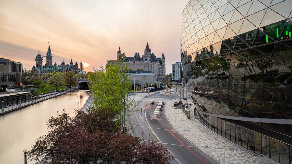 Sunset view of the canal and Parliament Hill in Ottawa, Ontario